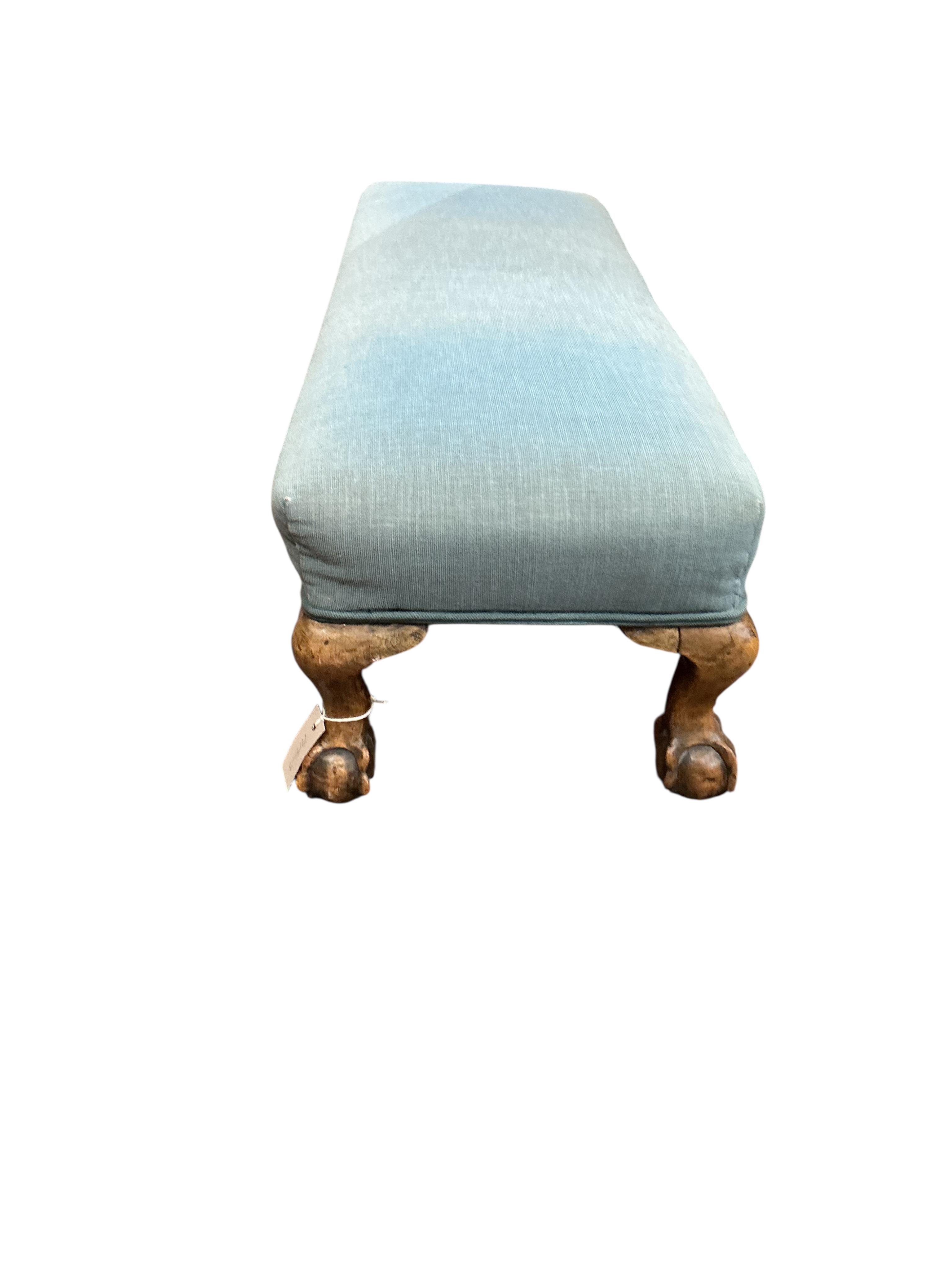 An early 20th century beech fender stool, width 110cm, depth 35cm, height 26cm